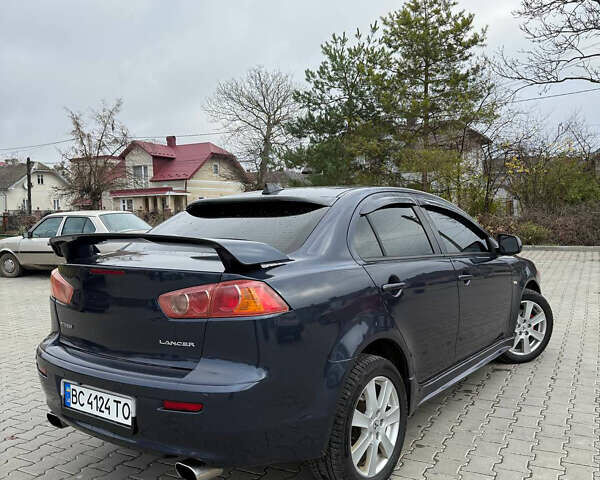 Синий Мицубиси Лансер, объемом двигателя 2 л и пробегом 326 тыс. км за 5650 $, фото 6 на Automoto.ua