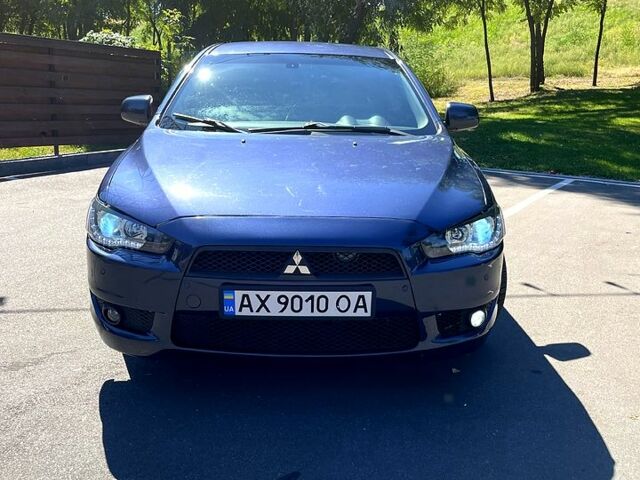 Синій Міцубісі Lancer, об'ємом двигуна 2 л та пробігом 300 тис. км за 5850 $, фото 1 на Automoto.ua
