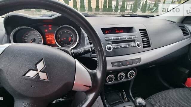 Синій Міцубісі Lancer, об'ємом двигуна 1.5 л та пробігом 206 тис. км за 5700 $, фото 3 на Automoto.ua