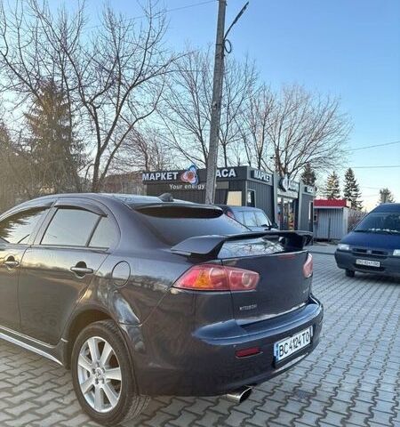 Синий Мицубиси Лансер, объемом двигателя 2 л и пробегом 330 тыс. км за 4850 $, фото 5 на Automoto.ua