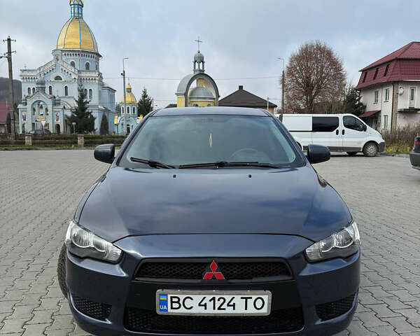 Синий Мицубиси Лансер, объемом двигателя 2 л и пробегом 326 тыс. км за 5650 $, фото 3 на Automoto.ua