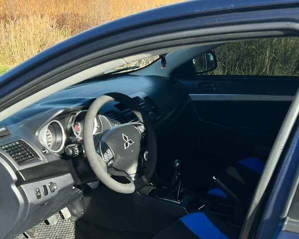 Мицубиси Лансер 2007 в Ивано-Франковске на Automoto.ua Синий Мицубиси Лансер, объемом двигателя 2 л и пробегом 209 тыс. км за 4200 $, фото 5 на Automoto.ua
