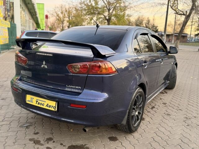 Синій Міцубісі Lancer, об'ємом двигуна 2 л та пробігом 189 тис. км за 7350 $, фото 5 на Automoto.ua