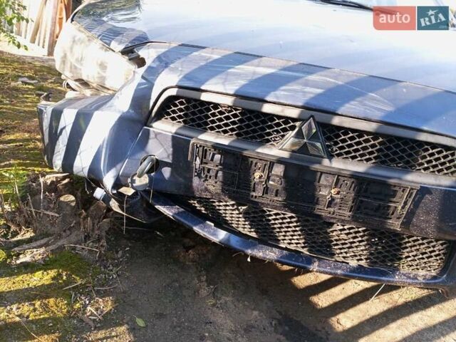 Синий Мицубиси Лансер, объемом двигателя 1.5 л и пробегом 207 тыс. км за 2500 $, фото 6 на Automoto.ua