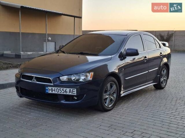Синій Міцубісі Lancer, об'ємом двигуна 2 л та пробігом 234 тис. км за 6700 $, фото 2 на Automoto.ua
