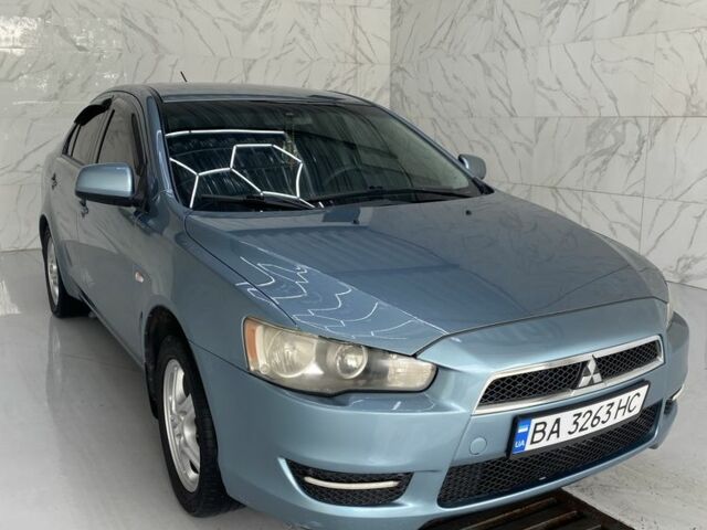Синий Мицубиси Лансер, объемом двигателя 1.5 л и пробегом 261 тыс. км за 5500 $, фото 3 на Automoto.ua