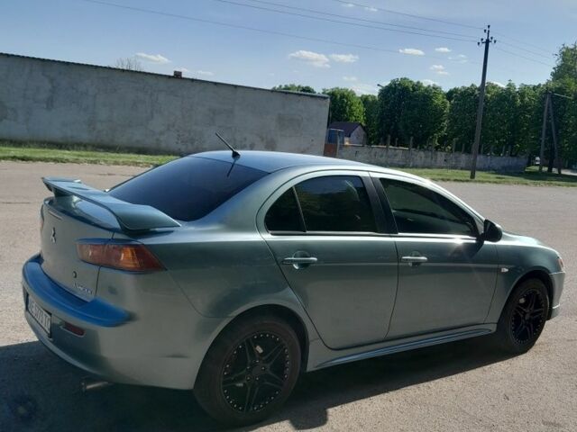 Синій Міцубісі Lancer, об'ємом двигуна 0 л та пробігом 148 тис. км за 7299 $, фото 4 на Automoto.ua