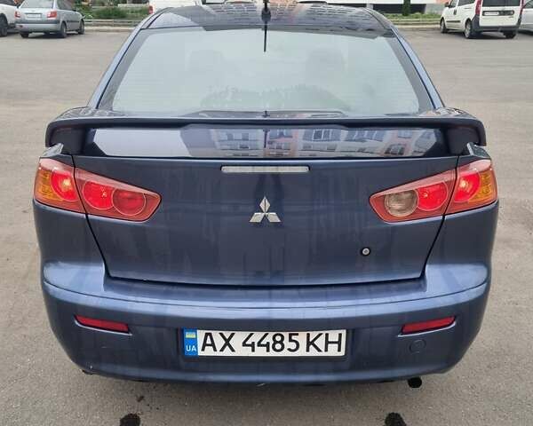 Синій Міцубісі Lancer, об'ємом двигуна 1.5 л та пробігом 230 тис. км за 4500 $, фото 1 на Automoto.ua