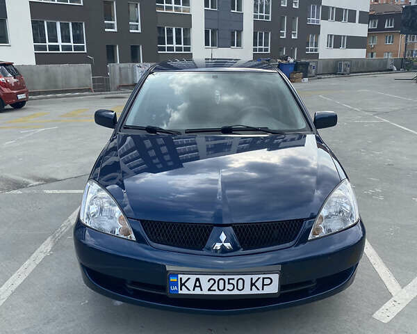 Синій Міцубісі Lancer, об'ємом двигуна 1.6 л та пробігом 206 тис. км за 5500 $, фото 2 на Automoto.ua