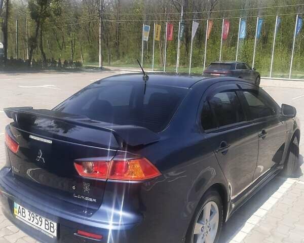 Синій Міцубісі Lancer, об'ємом двигуна 2 л та пробігом 142 тис. км за 8200 $, фото 3 на Automoto.ua