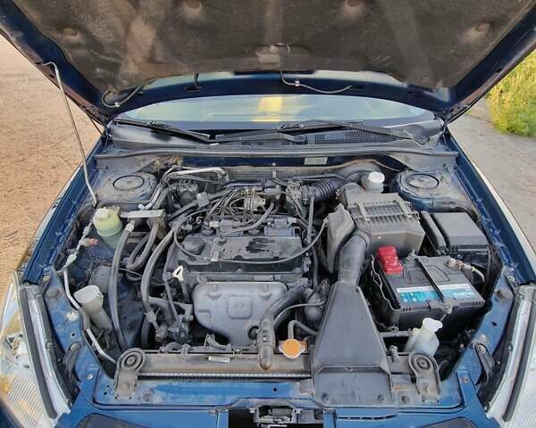 Синий Мицубиси Лансер, объемом двигателя 1.6 л и пробегом 197 тыс. км за 6500 $, фото 18 на Automoto.ua