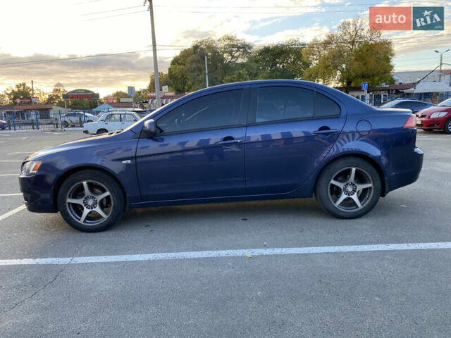 Синий Мицубиси Лансер, объемом двигателя 1.5 л и пробегом 247 тыс. км за 4500 $, фото 1 на Automoto.ua