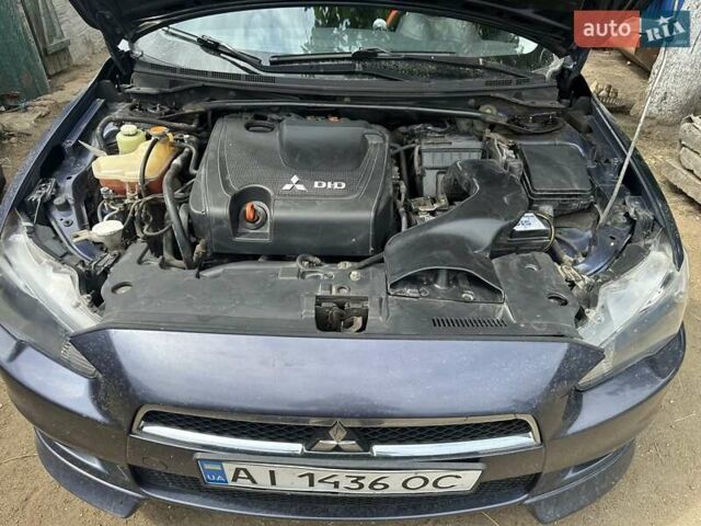 Синий Мицубиси Лансер, объемом двигателя 1.97 л и пробегом 260 тыс. км за 6000 $, фото 9 на Automoto.ua