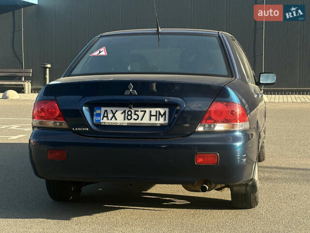Синій Міцубісі Lancer, об'ємом двигуна 1.6 л та пробігом 191 тис. км за 3700 $, фото 11 на Automoto.ua