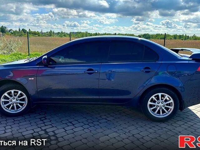 Синій Міцубісі Lancer, об'ємом двигуна 1.5 л та пробігом 173 тис. км за 6300 $, фото 1 на Automoto.ua