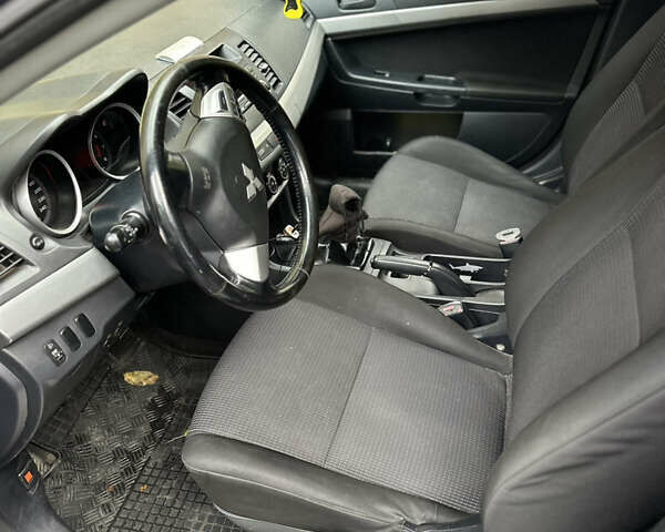 Міцубісі Lancer 2008 у Южноукраинске на Automoto.ua Синій Міцубісі Lancer, об'ємом двигуна 1.5 л та пробігом 176 тис. км за 5200 $, фото 9 на Automoto.ua