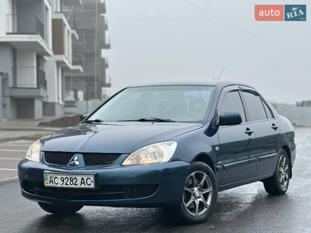 Синий Мицубиси Лансер, объемом двигателя 1.6 л и пробегом 187 тыс. км за 3799 $, фото 4 на Automoto.ua