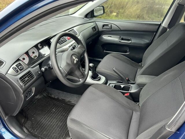 Синій Міцубісі Lancer, об'ємом двигуна 1.6 л та пробігом 126 тис. км за 5950 $, фото 9 на Automoto.ua