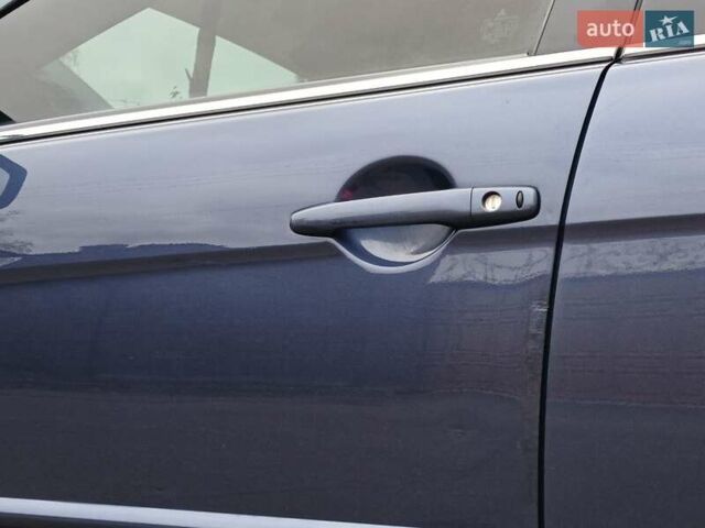 Синий Мицубиси Лансер, объемом двигателя 1.5 л и пробегом 220 тыс. км за 6999 $, фото 6 на Automoto.ua