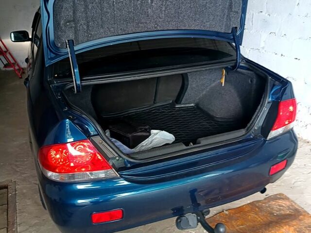 Міцубісі Lancer 2008 у Харкові на Automoto.ua Синій Міцубісі Lancer, об'ємом двигуна 1.6 л та пробігом 210 тис. км за 3700 $, фото 9 на Automoto.ua