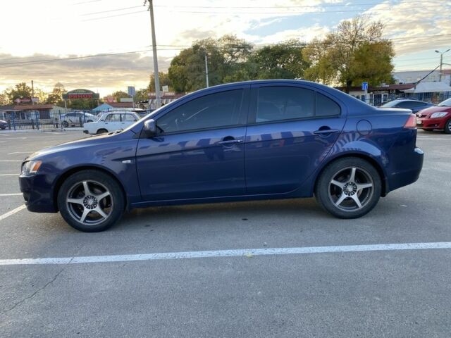 Синий Мицубиси Лансер, объемом двигателя 1.5 л и пробегом 247 тыс. км за 5000 $, фото 3 на Automoto.ua