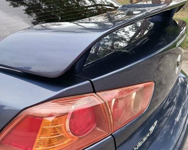 Синий Мицубиси Лансер, объемом двигателя 1.5 л и пробегом 220 тыс. км за 6999 $, фото 9 на Automoto.ua