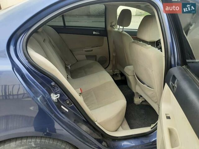 Синий Мицубиси Лансер, объемом двигателя 1.5 л и пробегом 220 тыс. км за 6999 $, фото 31 на Automoto.ua