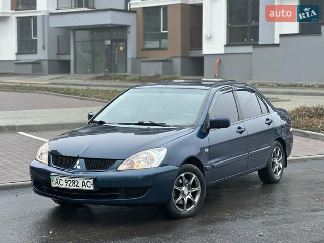Синий Мицубиси Лансер, объемом двигателя 1.6 л и пробегом 187 тыс. км за 3799 $, фото 1 на Automoto.ua
