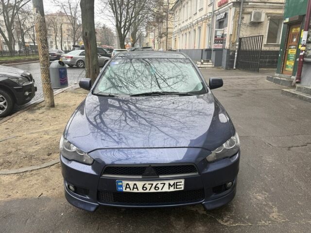 Синий Мицубиси Лансер, объемом двигателя 2 л и пробегом 200 тыс. км за 6700 $, фото 4 на Automoto.ua