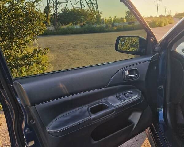 Синий Мицубиси Лансер, объемом двигателя 1.6 л и пробегом 197 тыс. км за 6500 $, фото 8 на Automoto.ua