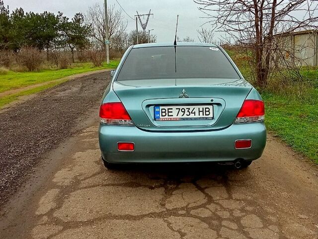 Синій Міцубісі Lancer, об'ємом двигуна 1.6 л та пробігом 167 тис. км за 4700 $, фото 5 на Automoto.ua