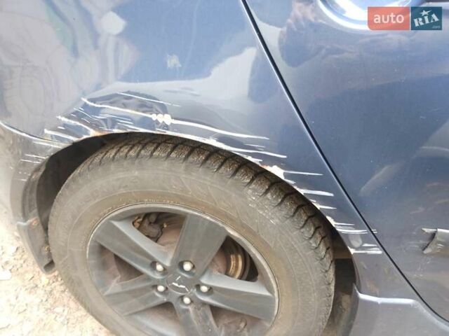 Синій Міцубісі Lancer, об'ємом двигуна 2 л та пробігом 265 тис. км за 5700 $, фото 2 на Automoto.ua
