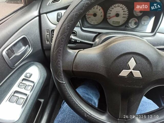 Синий Мицубиси Лансер, объемом двигателя 1.58 л и пробегом 168 тыс. км за 5700 $, фото 5 на Automoto.ua
