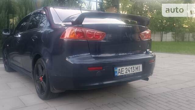 Синій Міцубісі Lancer, об'ємом двигуна 1.8 л та пробігом 223 тис. км за 7100 $, фото 3 на Automoto.ua