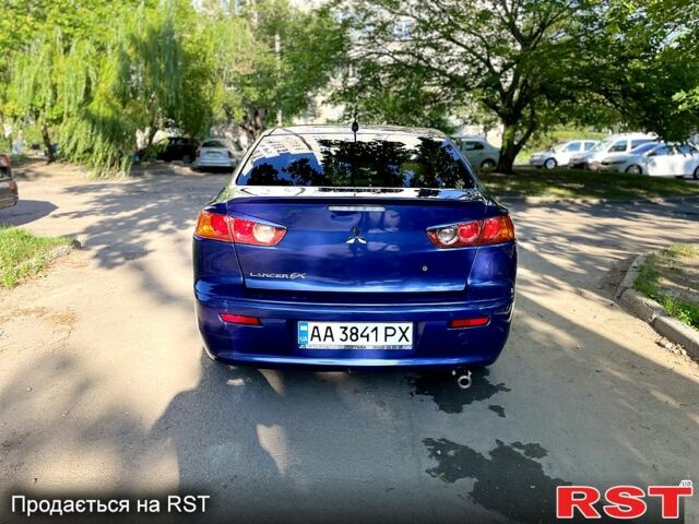 Синий Мицубиси Лансер, объемом двигателя 2 л и пробегом 150 тыс. км за 6250 $, фото 7 на Automoto.ua