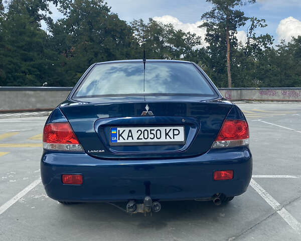 Синій Міцубісі Lancer, об'ємом двигуна 1.6 л та пробігом 206 тис. км за 5500 $, фото 8 на Automoto.ua