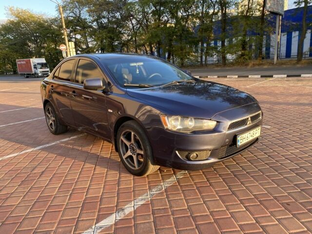 Синий Мицубиси Лансер, объемом двигателя 1.5 л и пробегом 247 тыс. км за 5000 $, фото 1 на Automoto.ua