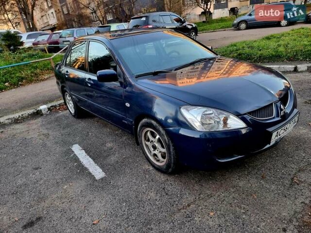 Синій Міцубісі Lancer, об'ємом двигуна 1.6 л та пробігом 298 тис. км за 2998 $, фото 3 на Automoto.ua