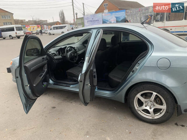 Синій Міцубісі Lancer, об'ємом двигуна 1.5 л та пробігом 250 тис. км за 4700 $, фото 13 на Automoto.ua