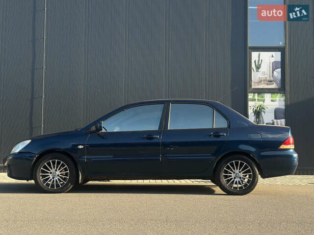 Синій Міцубісі Lancer, об'ємом двигуна 1.6 л та пробігом 191 тис. км за 3700 $, фото 4 на Automoto.ua