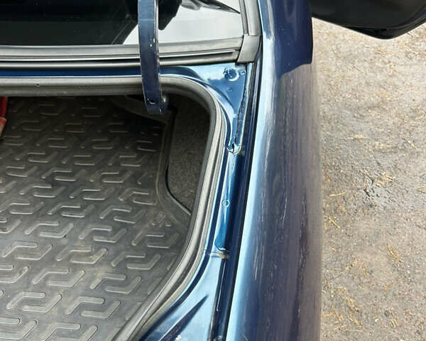 Синий Мицубиси Лансер, объемом двигателя 1.6 л и пробегом 150 тыс. км за 5700 $, фото 6 на Automoto.ua