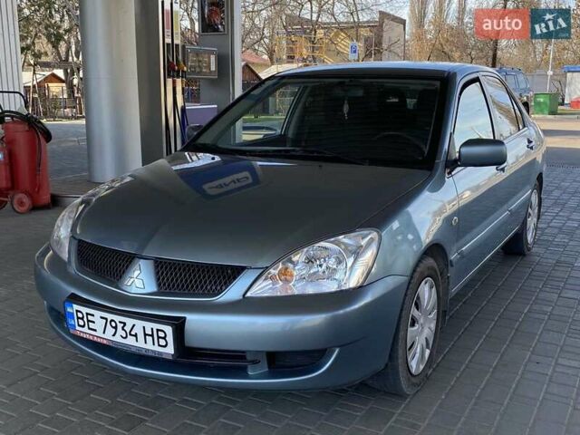 Синий Мицубиси Лансер, объемом двигателя 1.58 л и пробегом 166 тыс. км за 5500 $, фото 3 на Automoto.ua