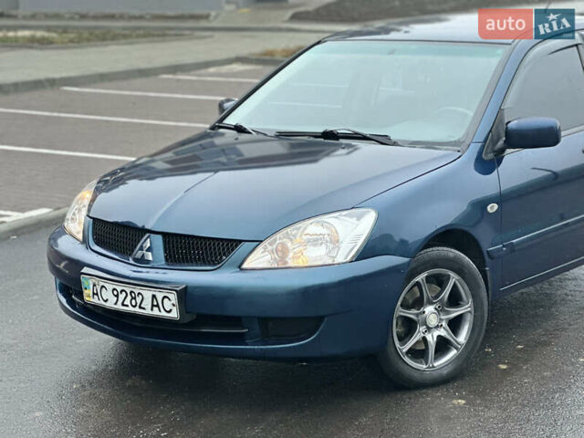 Синий Мицубиси Лансер, объемом двигателя 1.6 л и пробегом 187 тыс. км за 3799 $, фото 6 на Automoto.ua