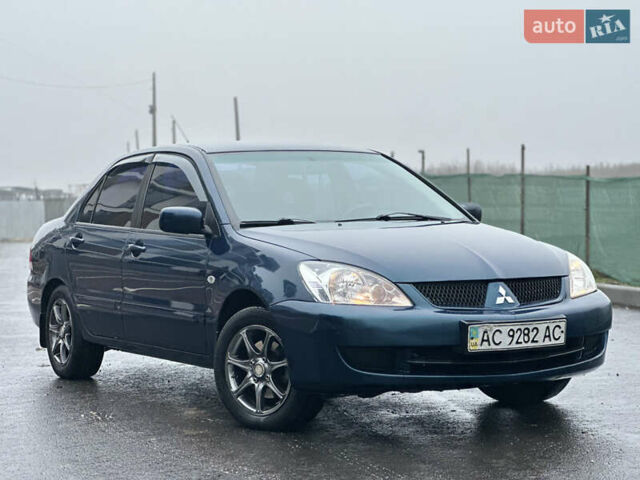 Синий Мицубиси Лансер, объемом двигателя 1.6 л и пробегом 187 тыс. км за 3799 $, фото 8 на Automoto.ua