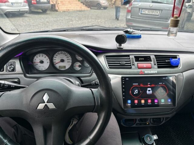 Міцубісі Lancer 2008 у Рівному на Automoto.ua Синій Міцубісі Lancer, об'ємом двигуна 1.6 л та пробігом 158 тис. км за 3900 $, фото 22 на Automoto.ua