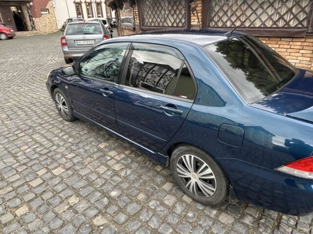 Міцубісі Lancer 2008 у Рівному на Automoto.ua Синій Міцубісі Lancer, об'ємом двигуна 1.6 л та пробігом 158 тис. км за 3900 $, фото 13 на Automoto.ua