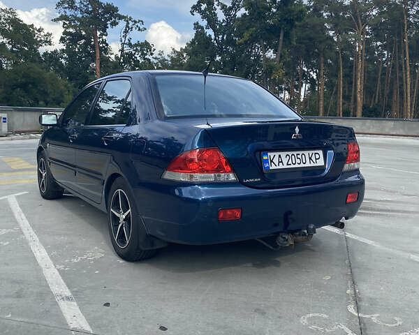 Синій Міцубісі Lancer, об'ємом двигуна 1.6 л та пробігом 206 тис. км за 5500 $, фото 4 на Automoto.ua