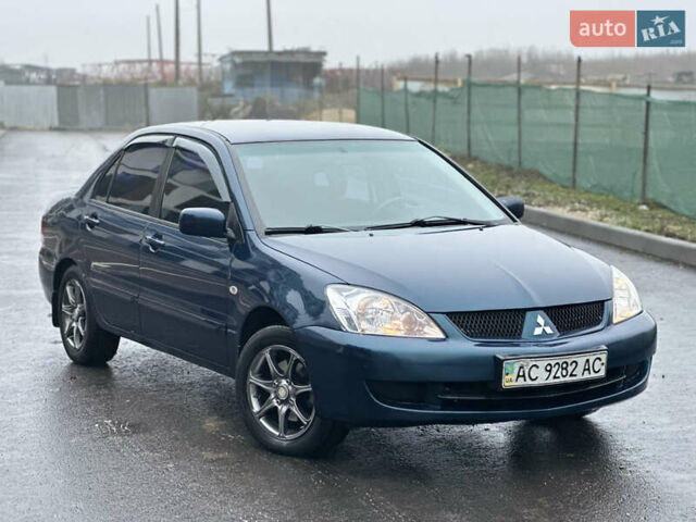 Синий Мицубиси Лансер, объемом двигателя 1.6 л и пробегом 187 тыс. км за 3799 $, фото 9 на Automoto.ua