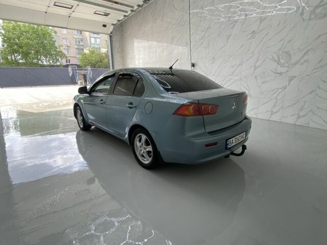 Синий Мицубиси Лансер, объемом двигателя 1.5 л и пробегом 261 тыс. км за 5500 $, фото 2 на Automoto.ua