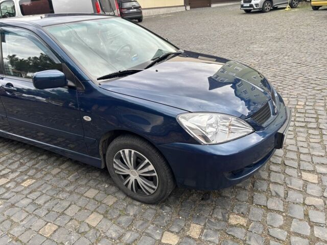 Міцубісі Lancer 2008 у Рівному на Automoto.ua Синій Міцубісі Lancer, об'ємом двигуна 1.6 л та пробігом 158 тис. км за 3900 $, фото 21 на Automoto.ua